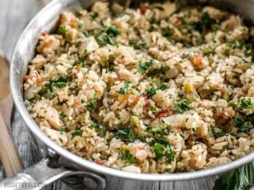 This Chimichurri Chicken and Rice is a bright and vibrant summer meal that cooks in just one pot to make dinner fast and easy. BudgetBytes.com