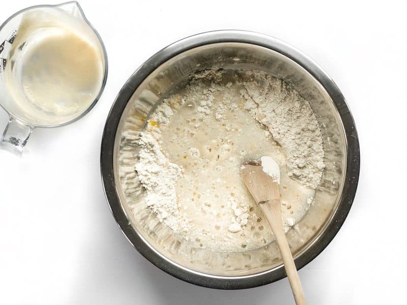 Pour yeast water into dry ingredients