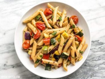 This classic summer Grilled Vegetable Pasta Salad features smoky fire licked vegetables and a homemade creamy balsamic vinaigrette. BudgetBytes.com