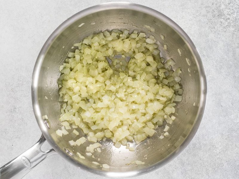 Sautéed Onion and Garlic in sauce pot