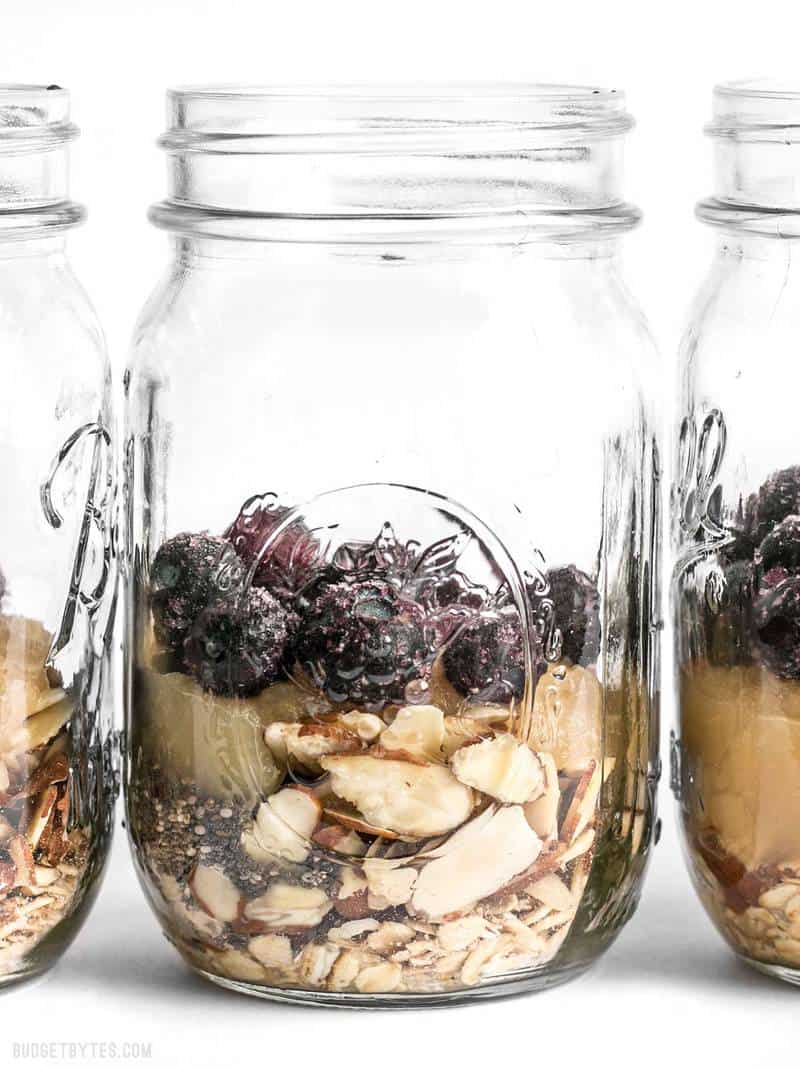 Close up of Blueberry Almond Overnight Oats in mason jars