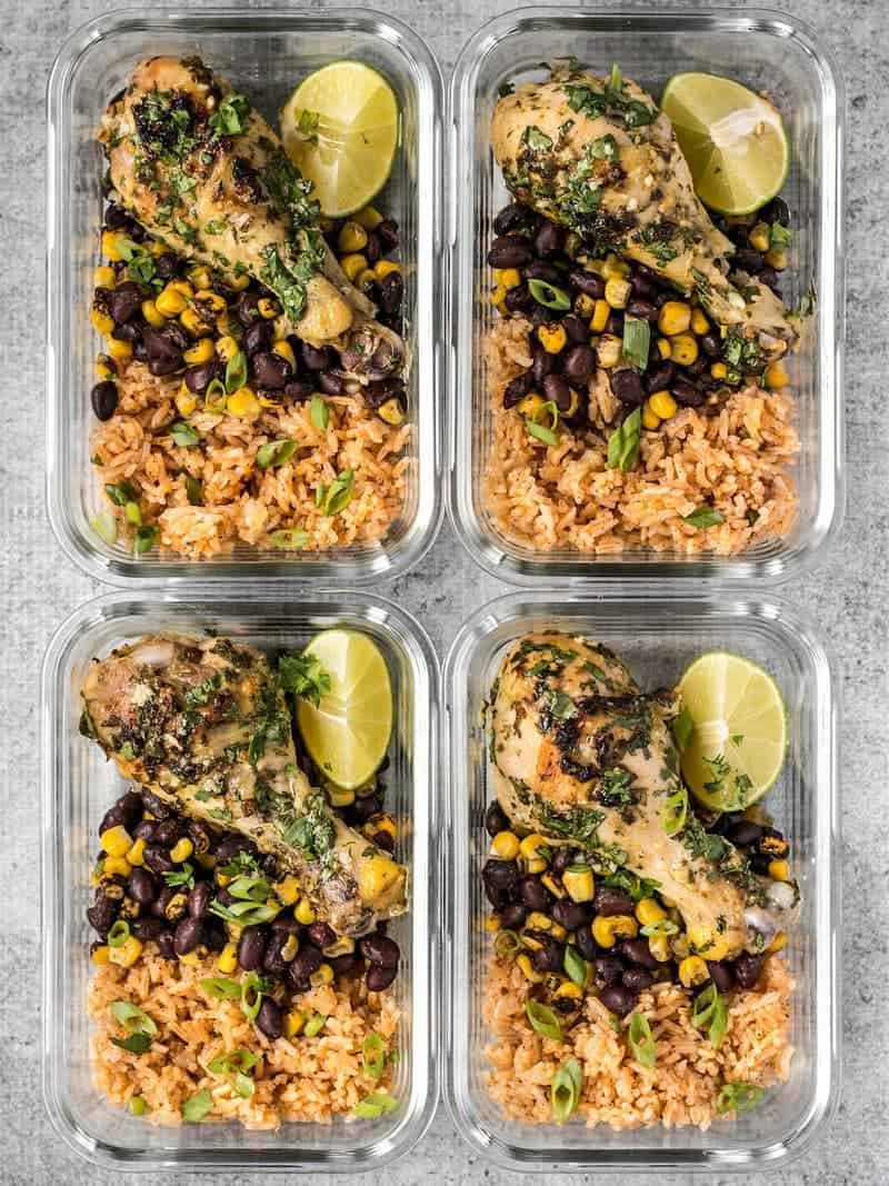 Four glass Cilantro Lime Chicken meal prep containers side by side