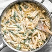 Creamy and rich, yet never heavy, this Lighter Spinach Alfredo Pasta is an easy and satisfying comfort food. BudgetBytes.com