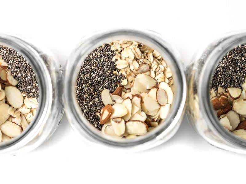 Oats Chia and Almonds in mason jars from above