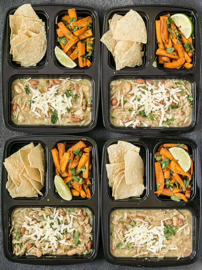 Four White Chicken Chili Meal Prep containers arranged in a rectangle