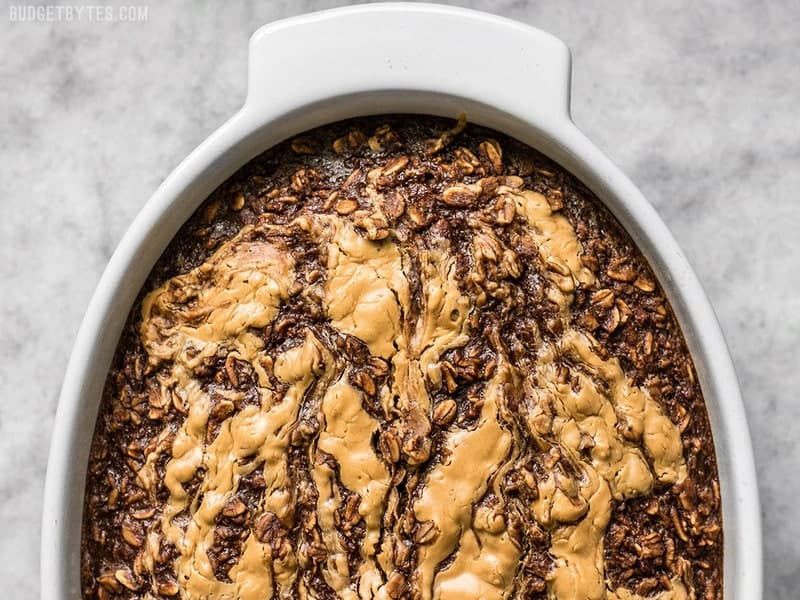 Close up of Peanut Butter Brownie Baked Oatmeal in the casserole dish