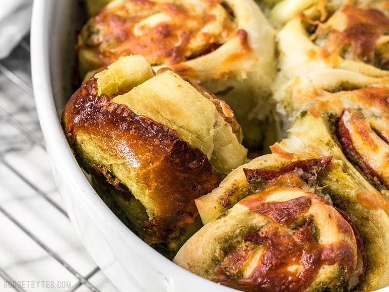 Close up of a Pesto Pizza Roll turned sideways in the baking dish