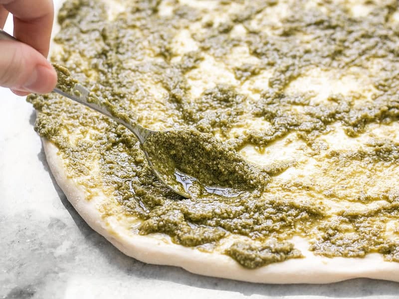 Spread Pesto onto Pesto Pizza Rolls