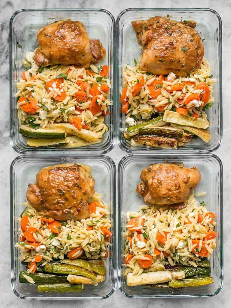 Four Maple Dijon Chicken Thigh Meal Prep containers lined up