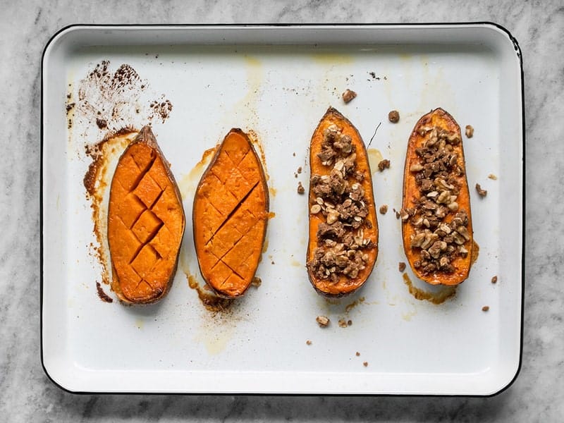 Scored baked Sweet Potatoes, add streusel topping