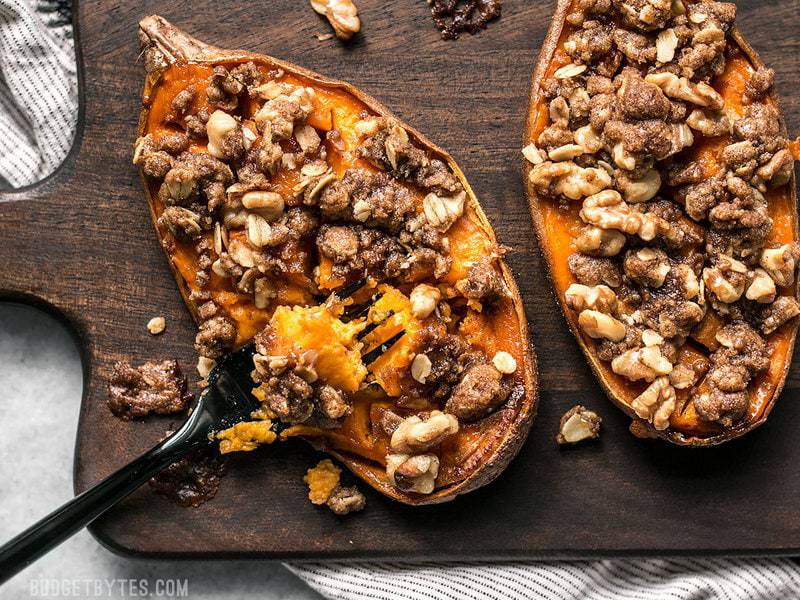 Close up of a fork in a Streuseled Sweet Potato