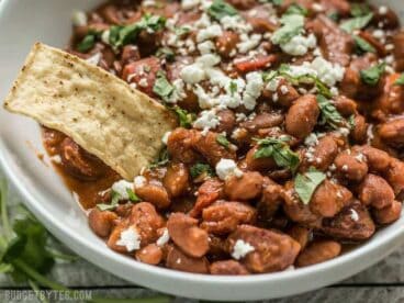 A little bit of Spanish chorizo is all it takes to turn a simple pot of pinto beans into a rich and flavorful meal! BudgetBytes.com