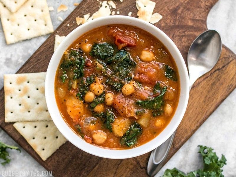 This Smoky Potato and Chickpea Stew is a hearty and filling plant-based dish that will keep you full and warm this winter! BudgetBytes.com