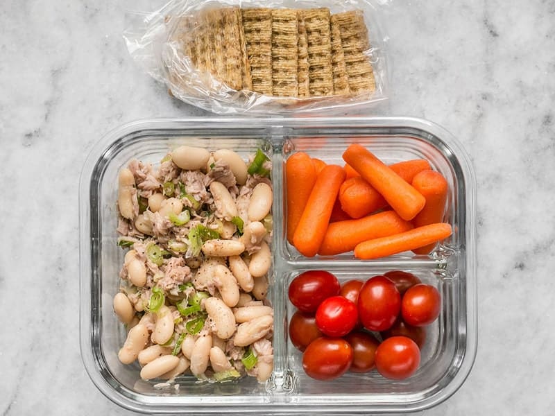 One Tuna and White Bean Meal Prep container with crackers on the side