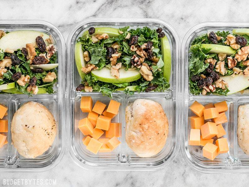 Three Apple Dijon Kale Salad Meal Prep containers in a row