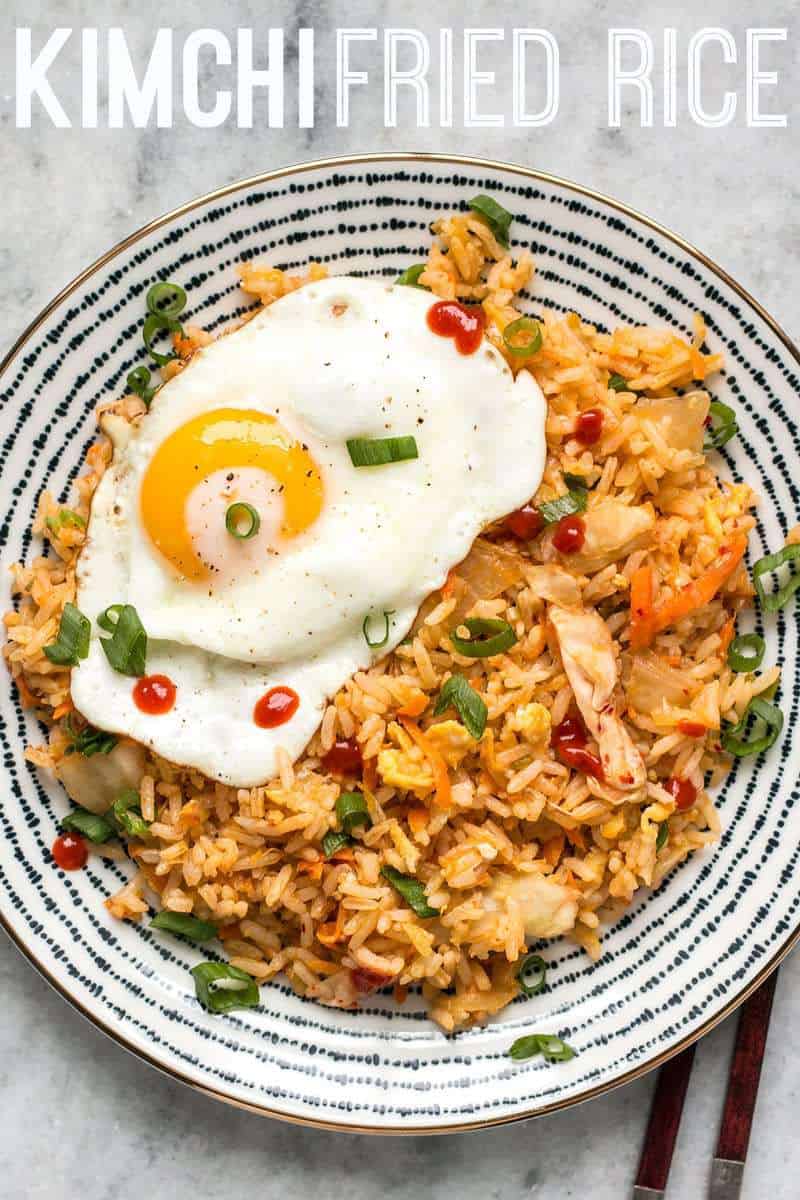 This Kimchi Fried rice is tangy, spicy, and the perfect way to use up all the leftover ingredients and scraps in your kitchen. BudgetBytes.com