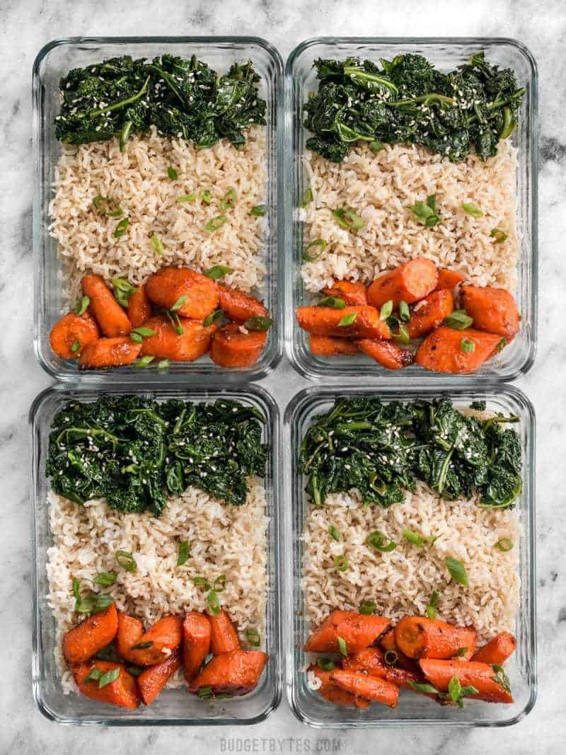Four glass Maple Miso Roasted Carrot Meal prep containers