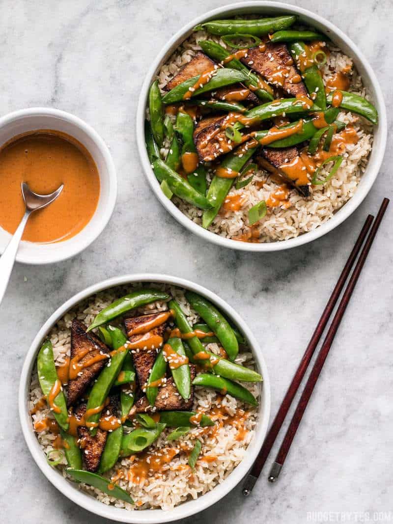 Two Soy Marinated Tofu Bowls with Spicy Peanut Sauce on the Side