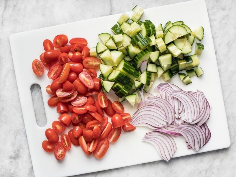 Chop cucumber tomato onion