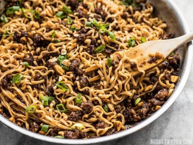 Sweet, salty, rich, and crunchy, these Pork and Peanut Dragon Noodles hit all the bases. It’s fast, easy comfort food for busy nights! BudgetBytes.com