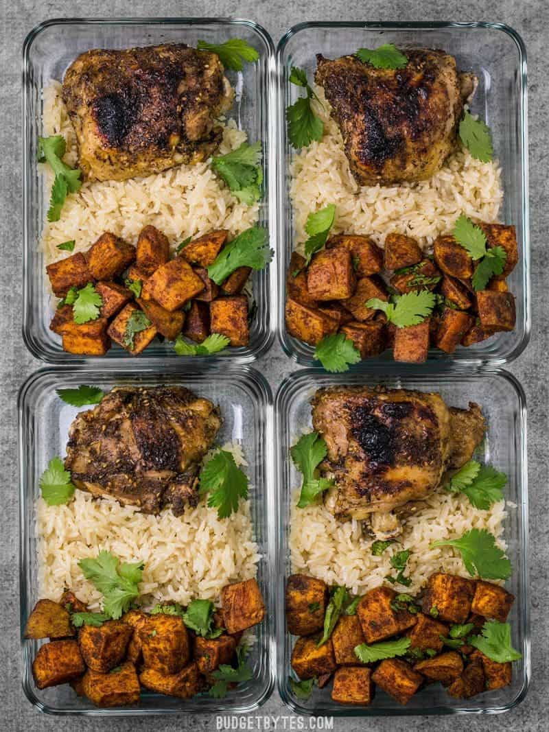 Four Pressure Cooker Chicken and Rice Meal Prep containers side by side