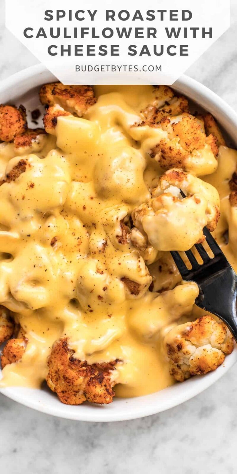 close up of a bowl of roasted cauliflower covered in cheese sauce, title text at the top