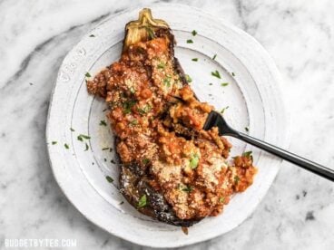 Roasted Eggplant with Meat Sauce is an elegant low carb main dish that will leave you satisfied. Pair with a simple green salad for a complete meal. BudgetBytes.com
