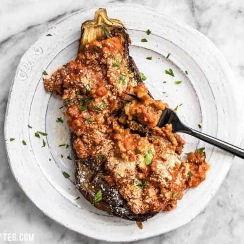 Roasted Eggplant with Meat Sauce is an elegant low carb main dish that will leave you satisfied. Pair with a simple green salad for a complete meal. BudgetBytes.com