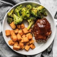 Make an entire dinner for two at one time with this fast and easy Sheet Pan BBQ Meatloaf Dinner. Perfect for meal prep! BudgetBytes.com