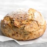 This Tomato Basil No Knead Bread is the perfect partner for your winter soups and stews, and is half the cost of a store bought artisan loaf. BudgetBytes.com