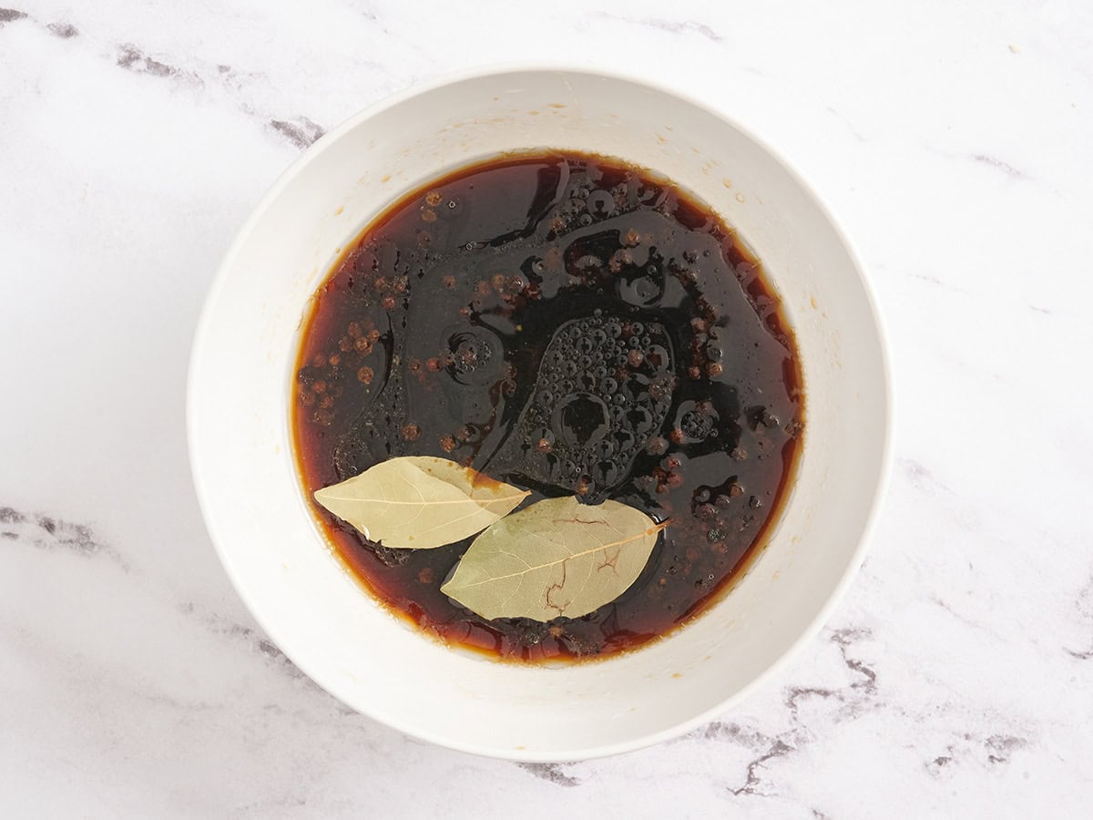 Chicken adobo marinade ingredients in a bowl.