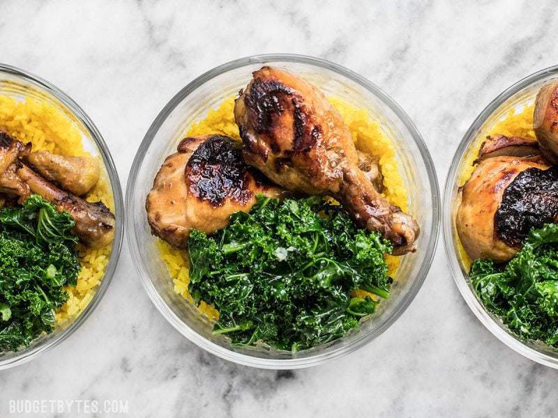 Three glass Chicken Adobo Meal Prep containers in a row