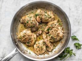 A quick and buttery herb pan sauce transforms these simple chicken thighs into decadent Herb Butter Chicken Thighs. BudgetBytes.com