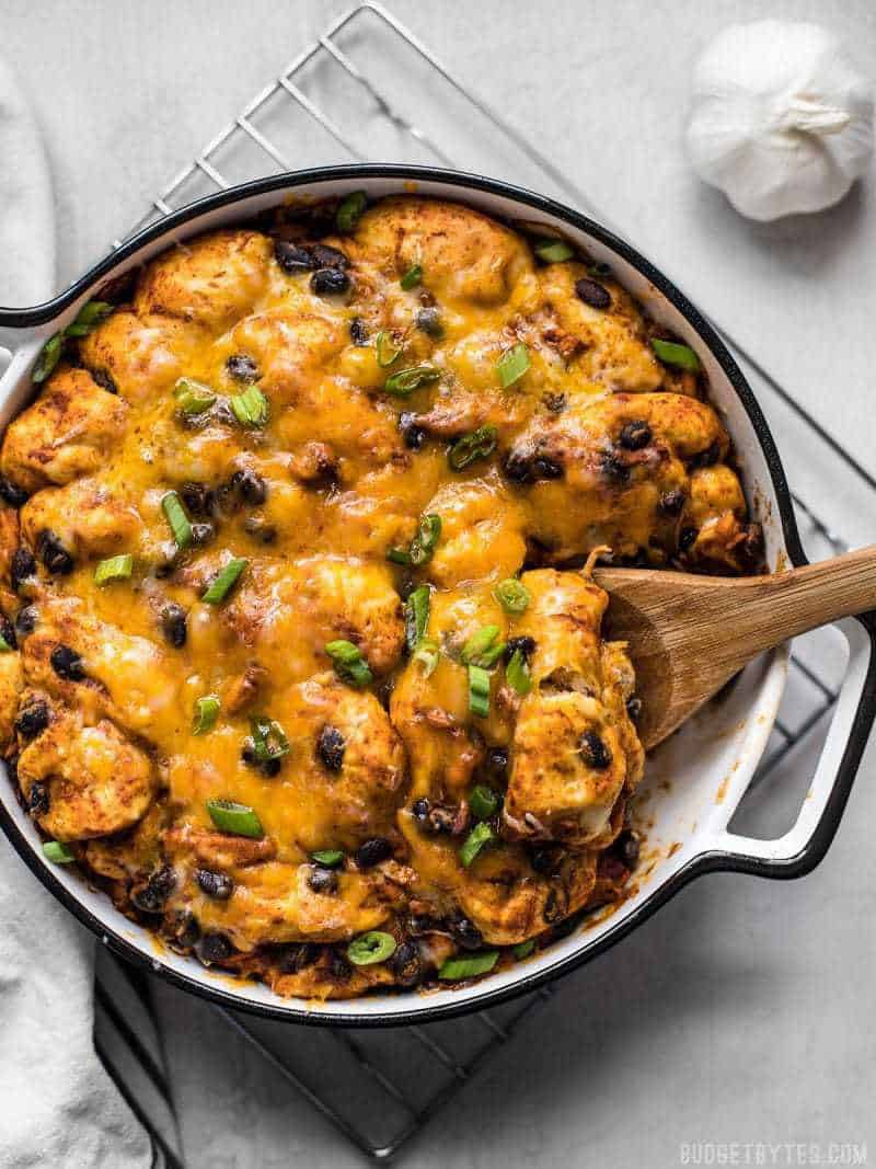 If you love bubble up casseroles but don’t love canned biscuits, you’ve got to try this from-scratch Enchilada Bubble Up Casserole. BudgetBytes.com