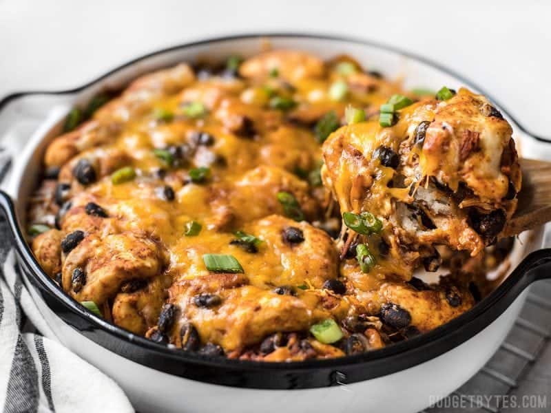 If you love bubble up casseroles but don’t love canned biscuits, you’ve got to try this from-scratch Enchilada Bubble Up Casserole. BudgetBytes.com