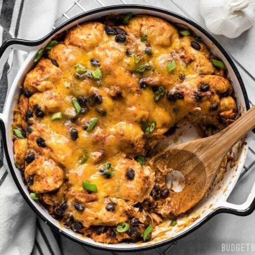 If you love bubble up casseroles but don’t love canned biscuits, you’ve got to try this from-scratch Enchilada Bubble Up Casserole. BudgetBytes.com