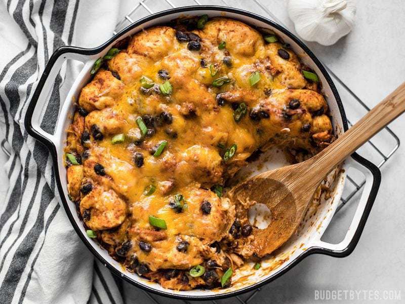 If you love bubble up casseroles but don’t love canned biscuits, you’ve got to try this from-scratch Enchilada Bubble Up Casserole. BudgetBytes.com
