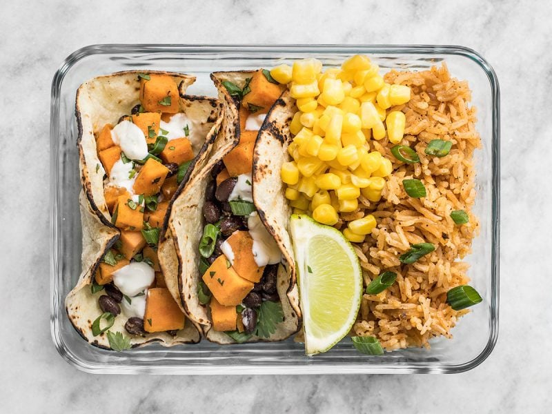 One single Sweet Potato Taco Meal Prep container with lime