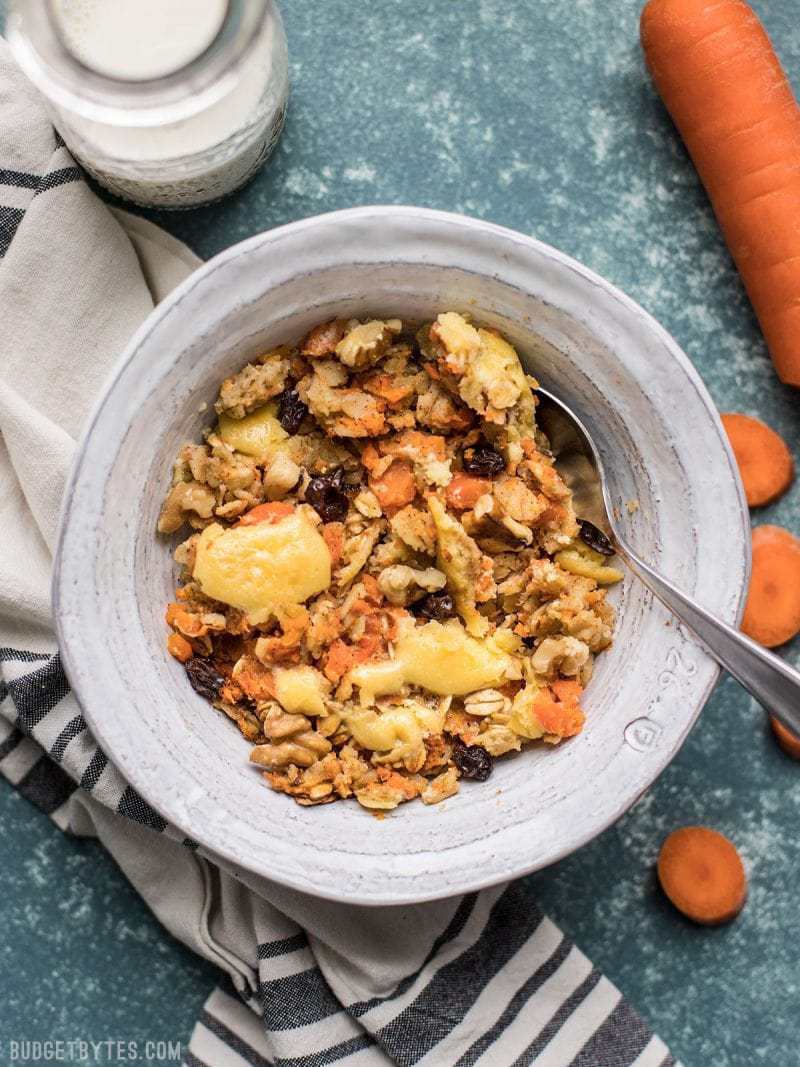 This Carrot Cake Baked Oatmeal is packed with good-for-you carrots, only a little sugar, and pops of sweetness from raisins and a cheesecake-inspired topping. BudgetBytes.com