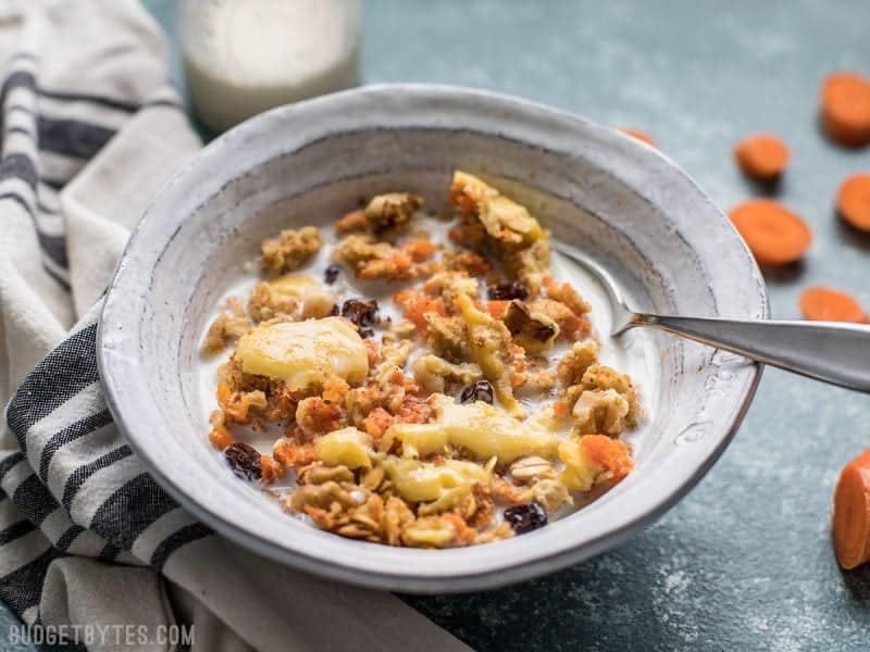 A bowl of Carrot Cake Baked Oatmeal with milk ready to be eaten