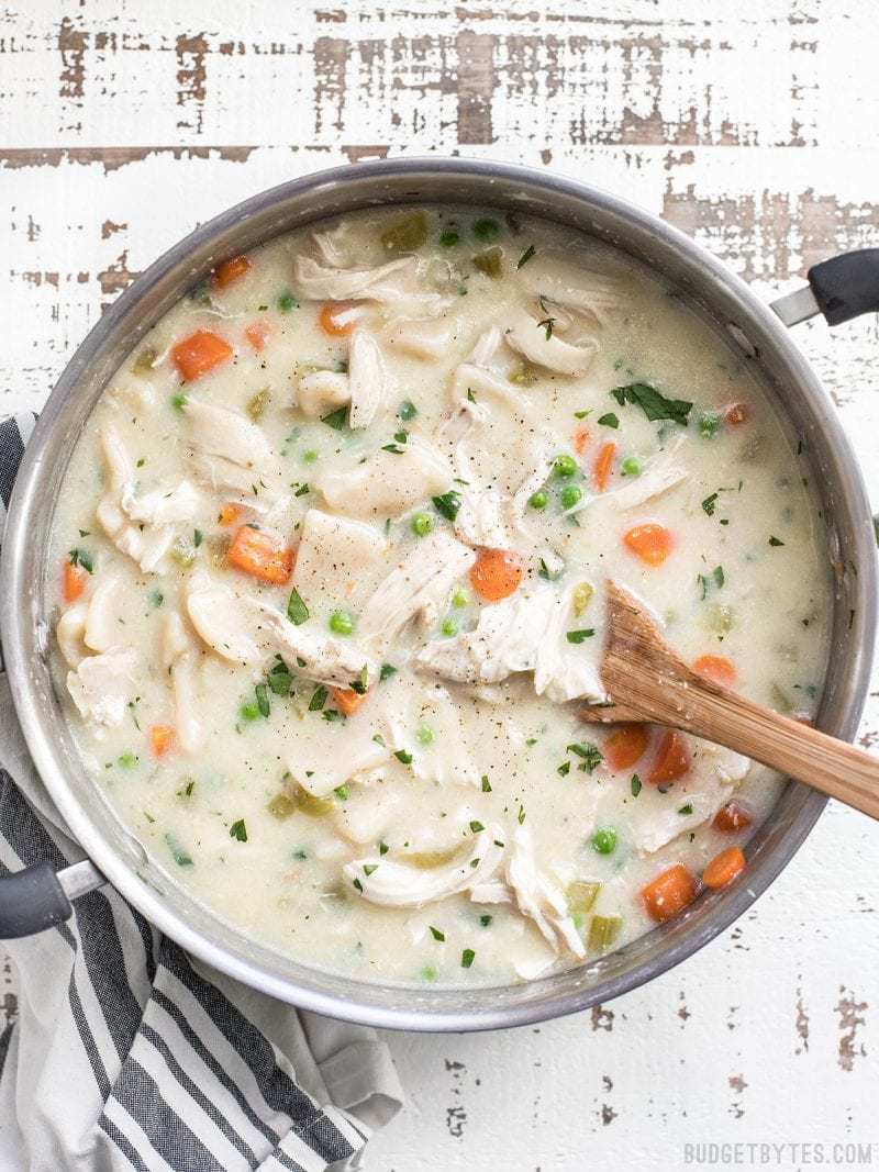 A large pot full of warm and comforting Chicken and Dumplings with Vegetables