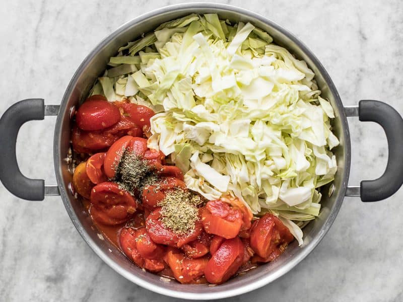 Add Stewed Tomatoes and Cabbage to soup pot