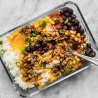The Easiest Burrito Bowl Meal Prep that you can put together in about 30 minutes with minimal cooking, chopping, and nothing to pack on the side. Lunch can be easy and tasty! BudgetBytes.com