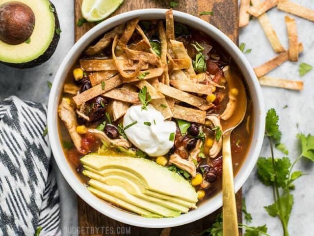 This Slow Cooker Chicken Tortilla Soup offers a deep, comforting, smoky flavor with simple ingredients and minimal effort. BudgetBytes.com