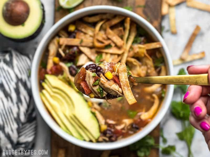 This Slow Cooker Chicken Tortilla Soup offers a deep, comforting, smoky flavor with simple ingredients and minimal effort. BudgetBytes.com