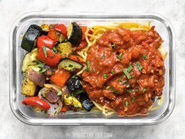 Comfort food and a generous helping of good-for-you vegetables, this Spaghetti and Roasted Vegetable Meal Prep is the best of both worlds! BudgetBytes.com