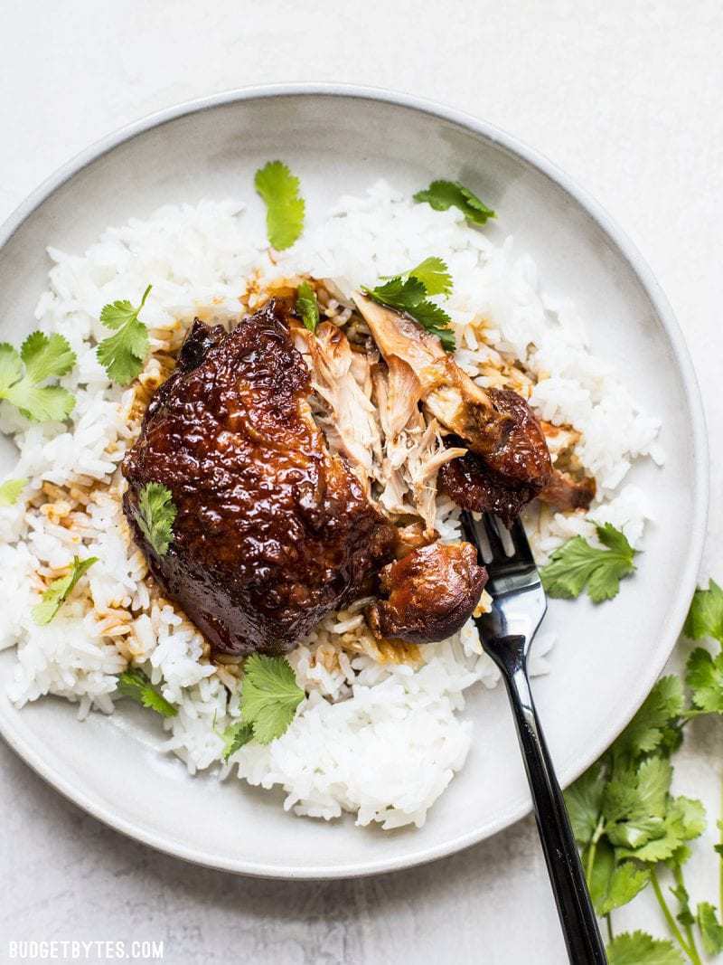 Honey Hoisin Garlic Chicken on a bed of white rice with cilantro