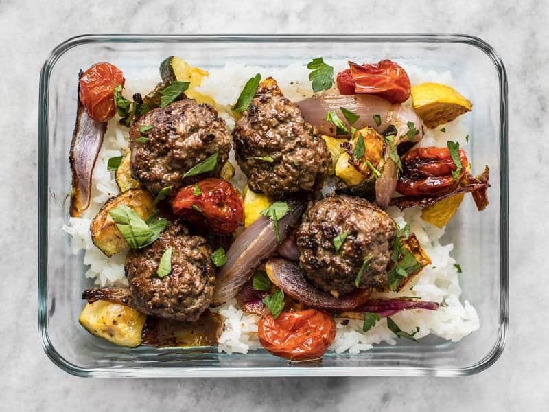 Beef Kofta Meatballs in a meal prep container with rice
