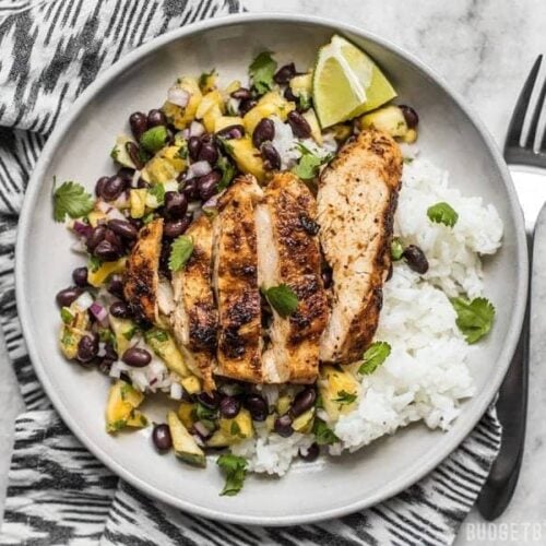 Full of fresh summery flavor, without needing a lot of ingredients, this Jerk Chicken with Pineapple Black Bean Salsa will become your new go-to easy summer meal!