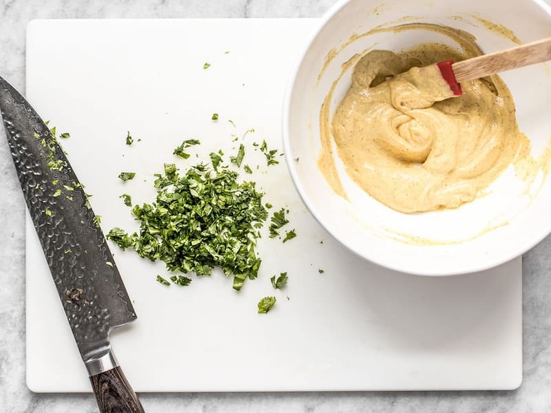 Add Chopped Cilantro to curried salad dressing